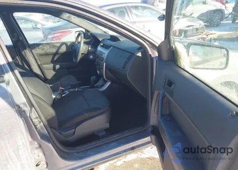 2009 Ford Focus Se z USA, uszkodzony, nr VIN 1FAHP35NX9W237115